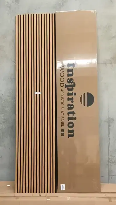 Teak-toned acoustic slat wall panel finish