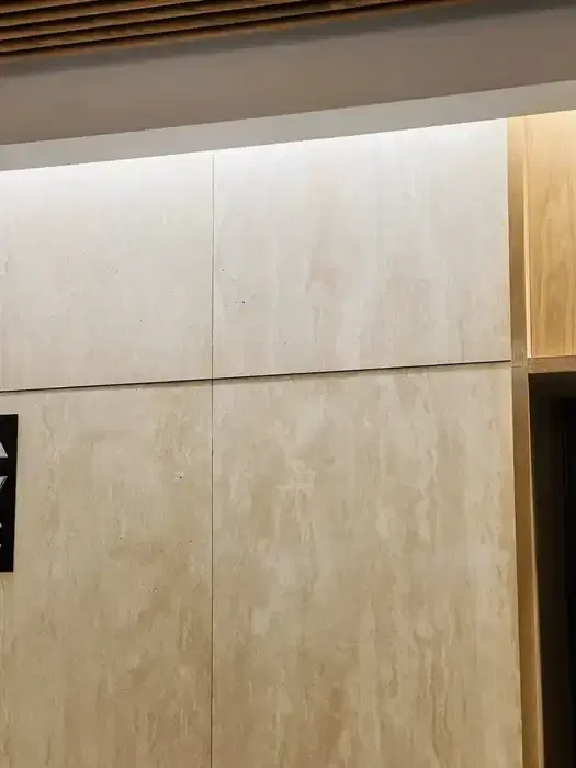Flexible stone cladding sample display photographed in a showroom